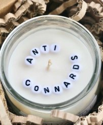 launa-natural-candle-anti-assholes-message